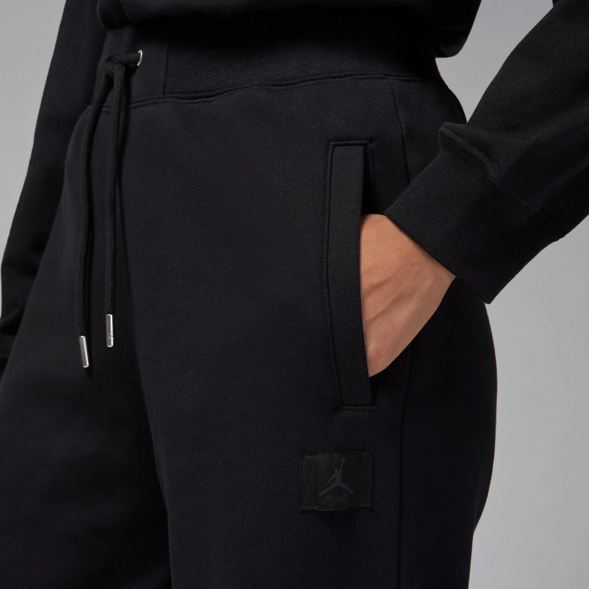 W AIR JORDAN FLIGHT FLEECE OPEN HEM PANTS "BLACK"